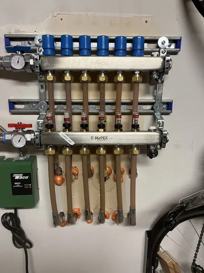 Plumber performing Water Heater Repair at a residential property in Lead